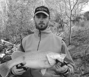 Ashley Hindson with a nice cold water cod he caught in the Murray River near the Torrumbarry Weir.